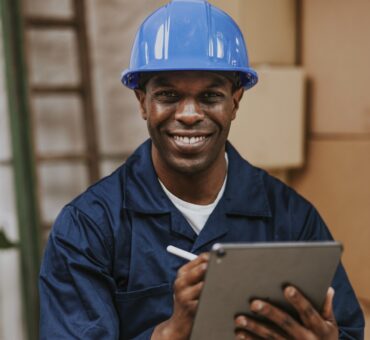 Professional moving service worker smiling